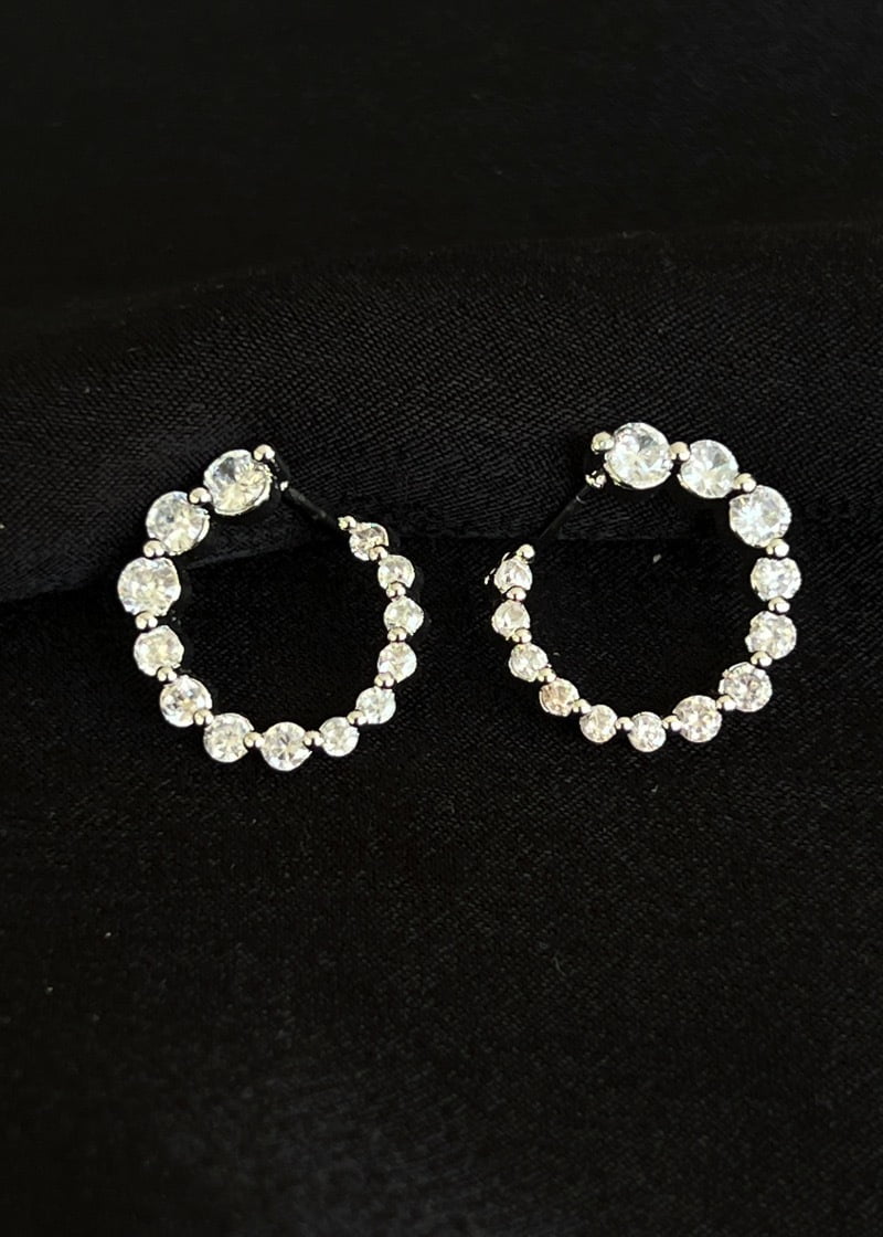 Swirled circle earrings.