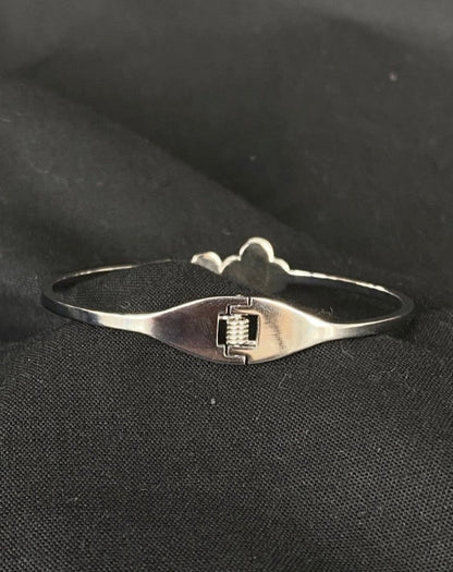 Beautiful hinged Van Cleef Bracelet