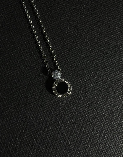 Roman numeral with diamanté necklace