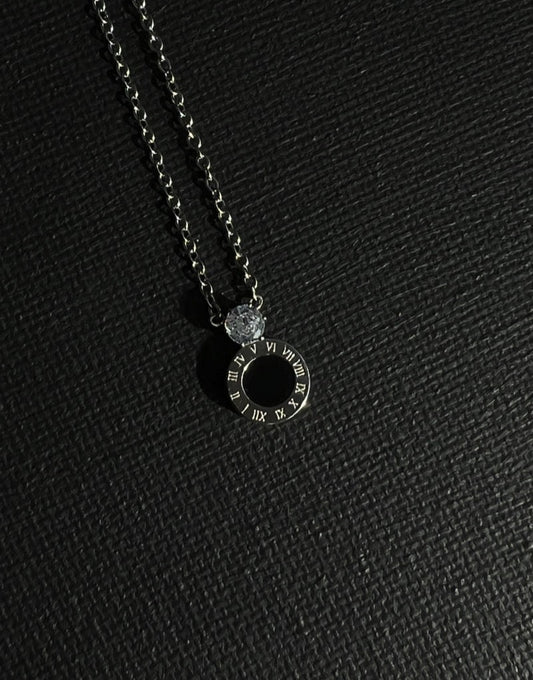 Roman numeral with diamanté necklace