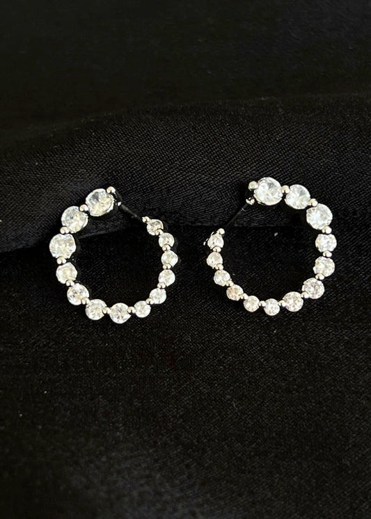 Swirled circle earrings.